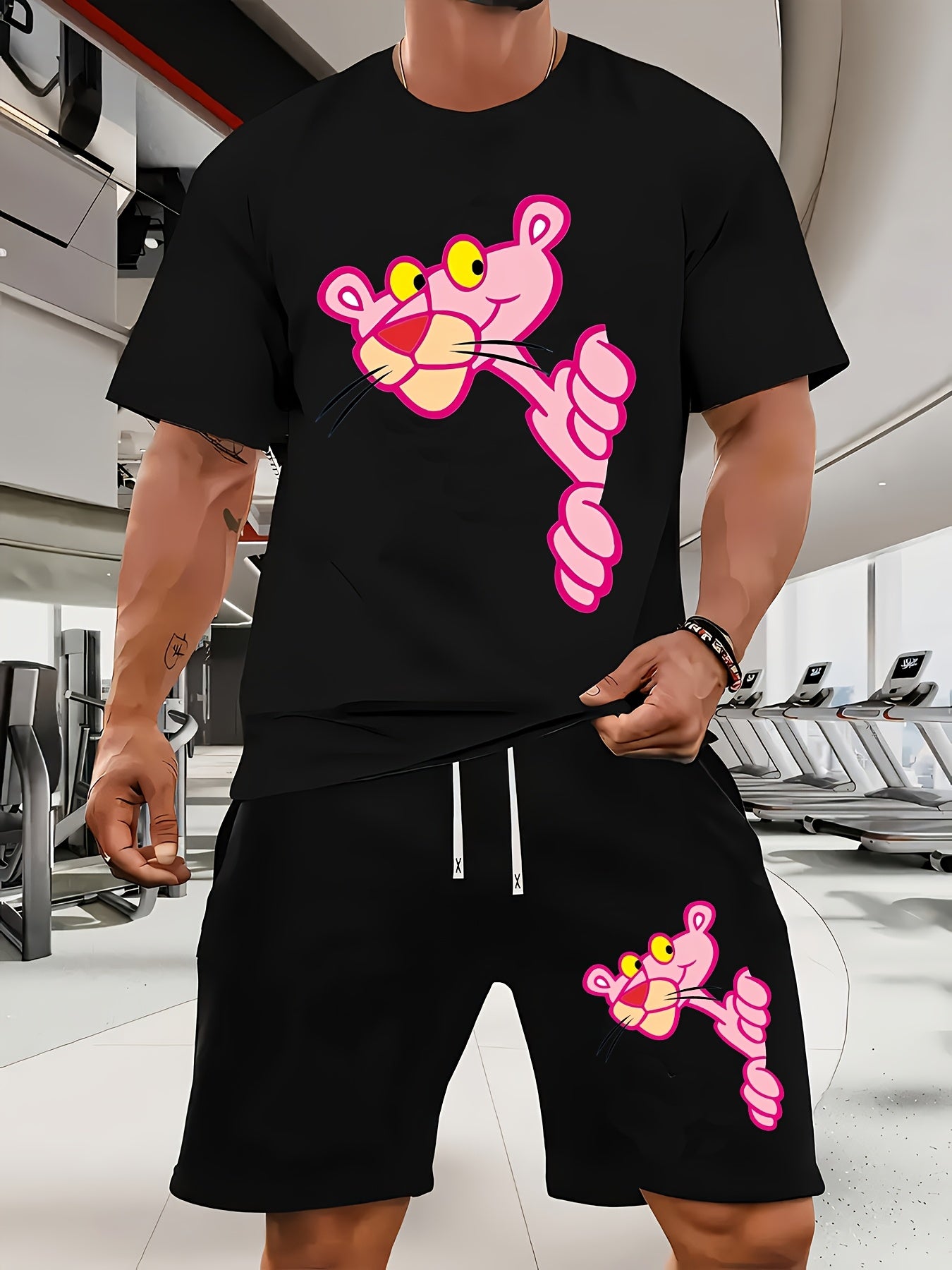 A Casual Sports Set Consisting of a Short-Sleeve T-Shirt Featuring a Stylish Pink Panther Cartoon Print And Fitted Shorts, Perfect for Spring And Summer Outfits.