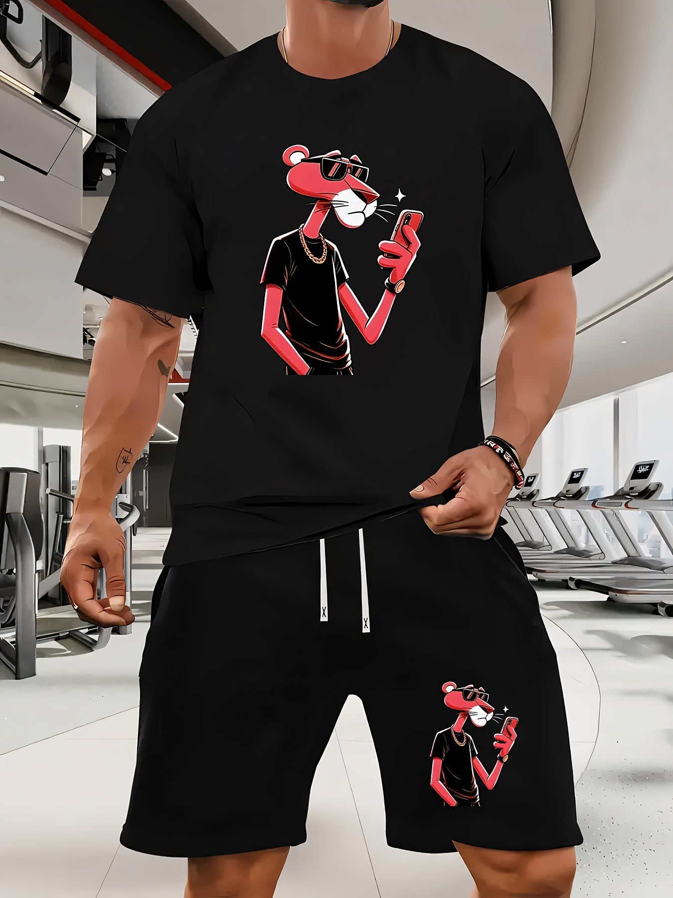 A Casual Sports Set Consisting of a Short-Sleeve T-Shirt Featuring a Stylish Pink Panther Cartoon Print And Fitted Shorts, Perfect for Spring And Summer Outfits.