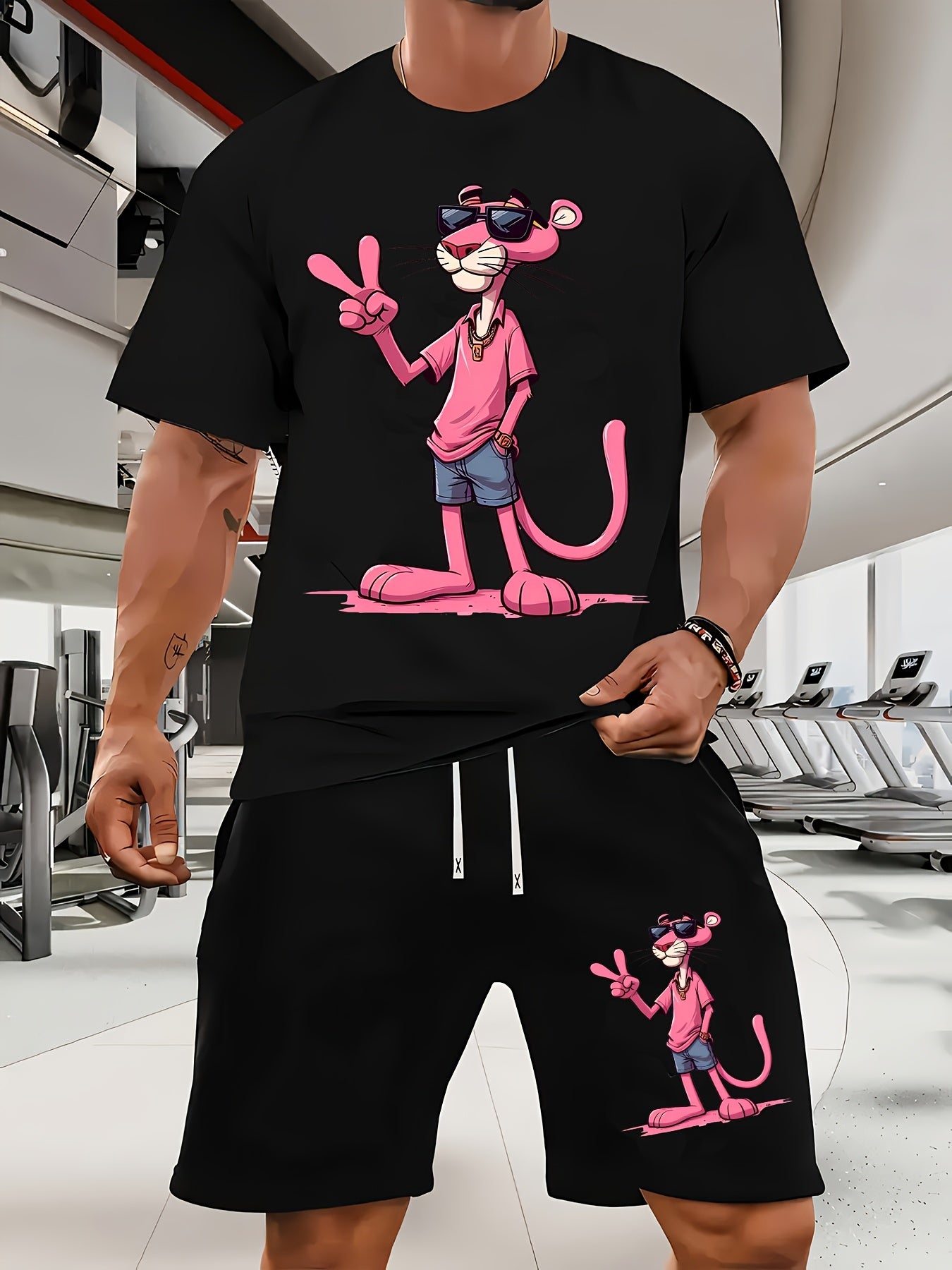 A Casual Sports Set Consisting of a Short-Sleeve T-Shirt Featuring a Stylish Pink Panther Cartoon Print And Fitted Shorts, Perfect for Spring And Summer Outfits.