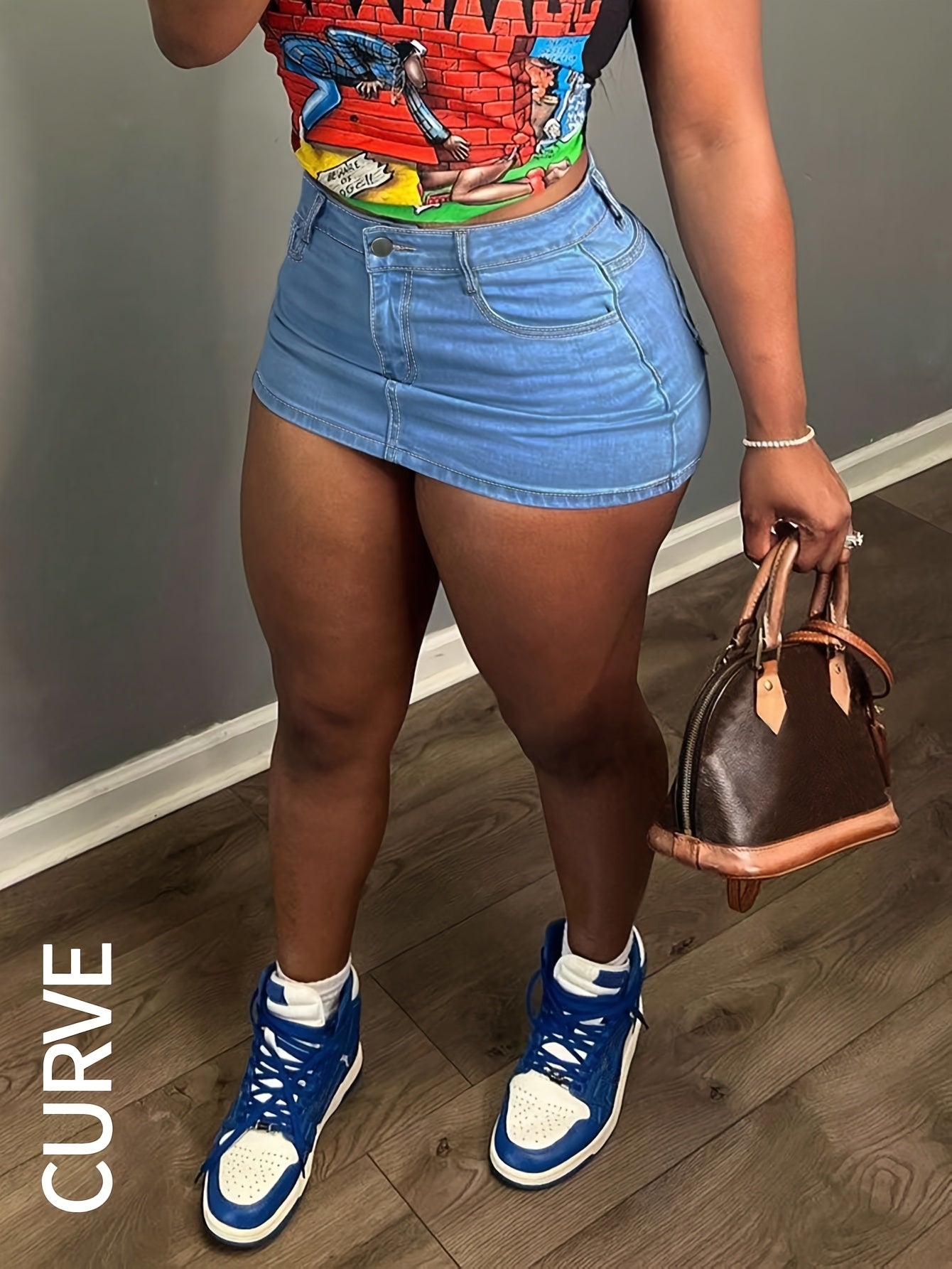 Women's Plus Size Figure Flattering Denim Mini, Unique Back Pocket Design Stretch Skirt for Confident Everyday Moments