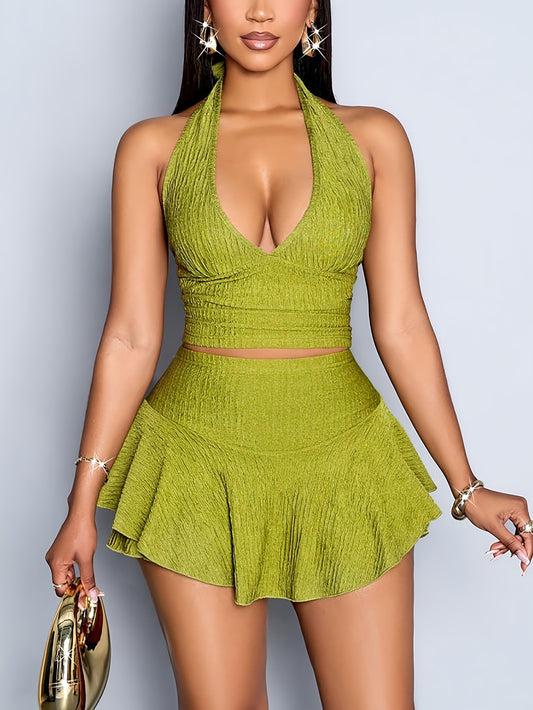 A Versatile Backless Outfit Featuring a Deep V-Neck Top And a Skirt with Pants