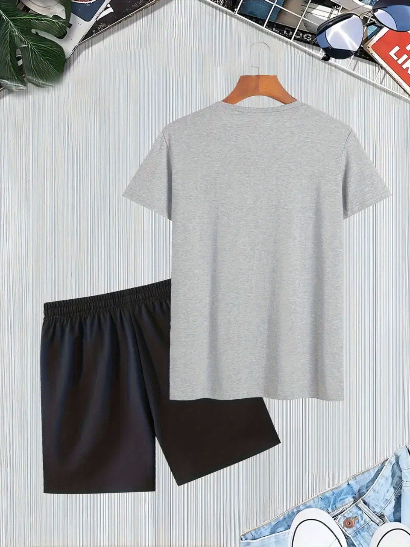 A Casual Sports Set Consisting of a Short-Sleeve T-Shirt Featuring a Stylish Pink Panther Cartoon Print And Fitted Shorts, Perfect for Spring And Summer Outfits.
